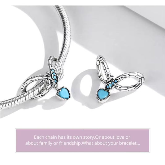 Elegant charm in 925 Sterling Silver: infinity snake design with blue heart. Pandora compatible – meaningful gift for love & eternity.