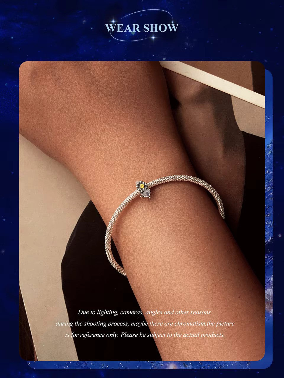 Sterling 925 Silver April Daisy Clear Birthstone Charm – Pandora Compatible worn on a stylish bracelet.