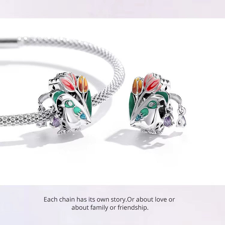 Charm-Anhänger „Vogel mit Tulpenblüten“ aus Sterlingsilber 925 – kompatibel mit Pandora