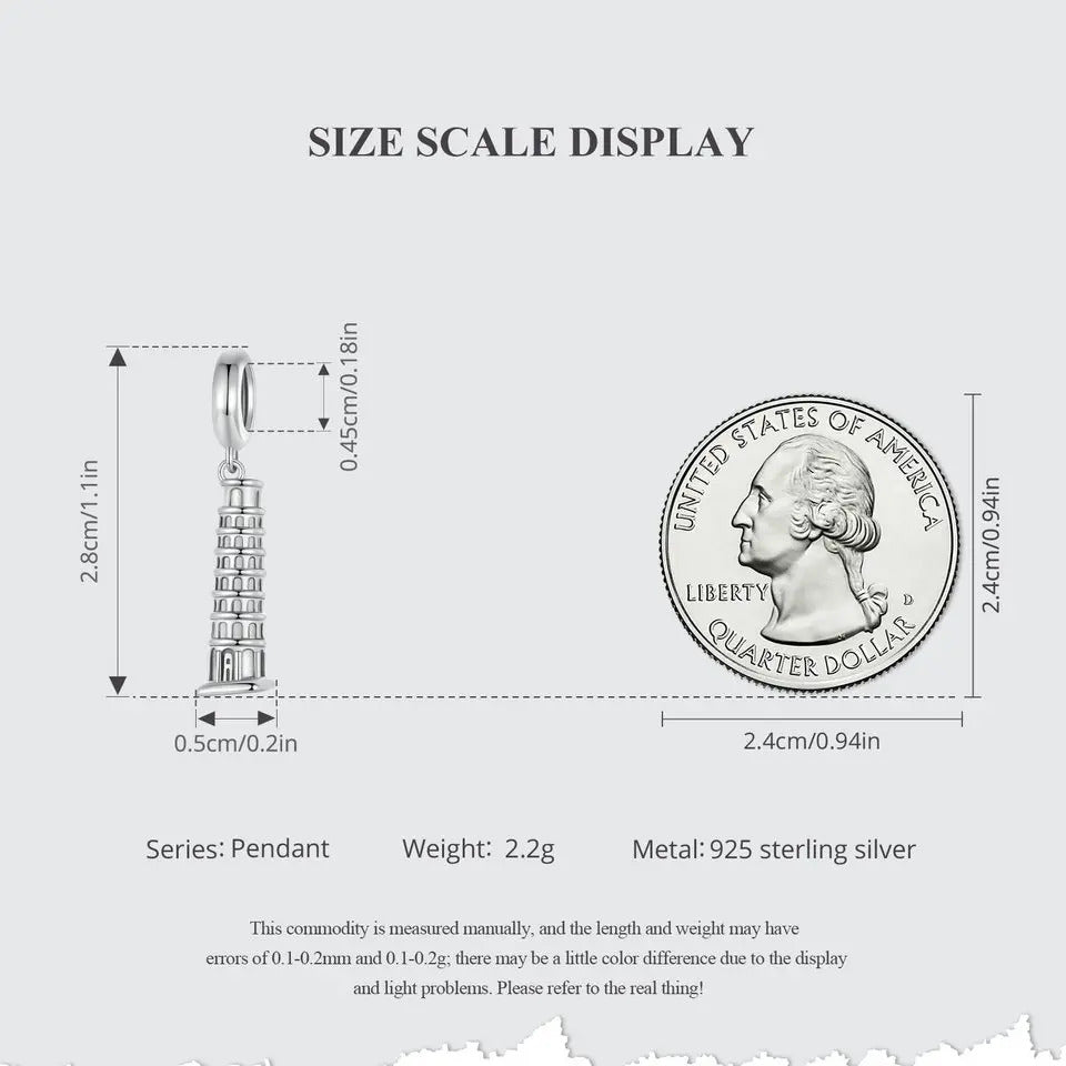 Size scale display of a pendant with a quarter dollar coin for comparison on a white background. the leaning pisa tower charm that fits pandora bracelet