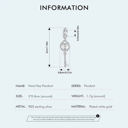 sterling 925 sterling silver Key charm, its in the shape of a heart with small zircon stones.
