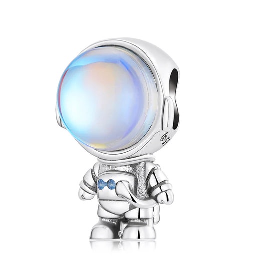 Silver charm with a colorful gem on a white background, astronaut charm